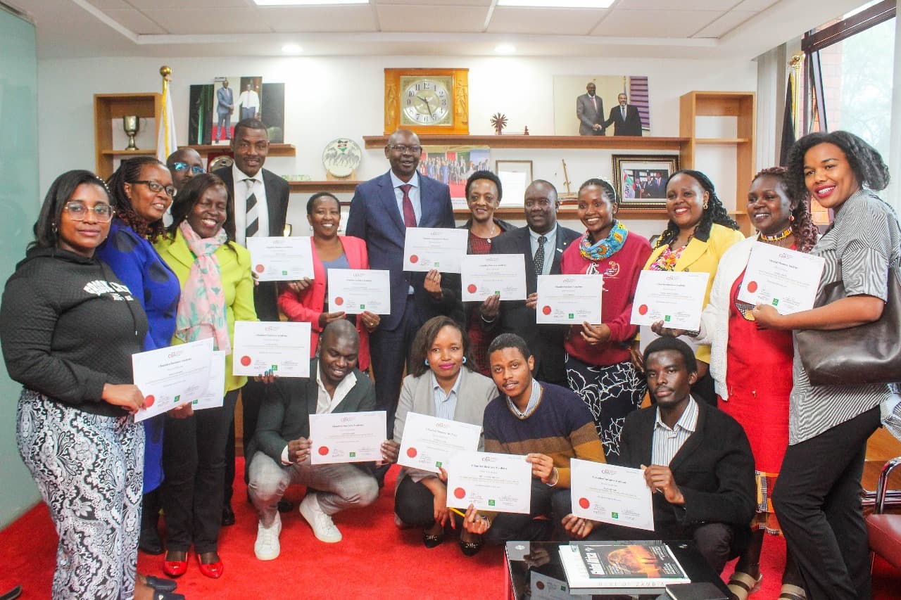 Chamber President Dr. Erick Rutto with CBA graduates